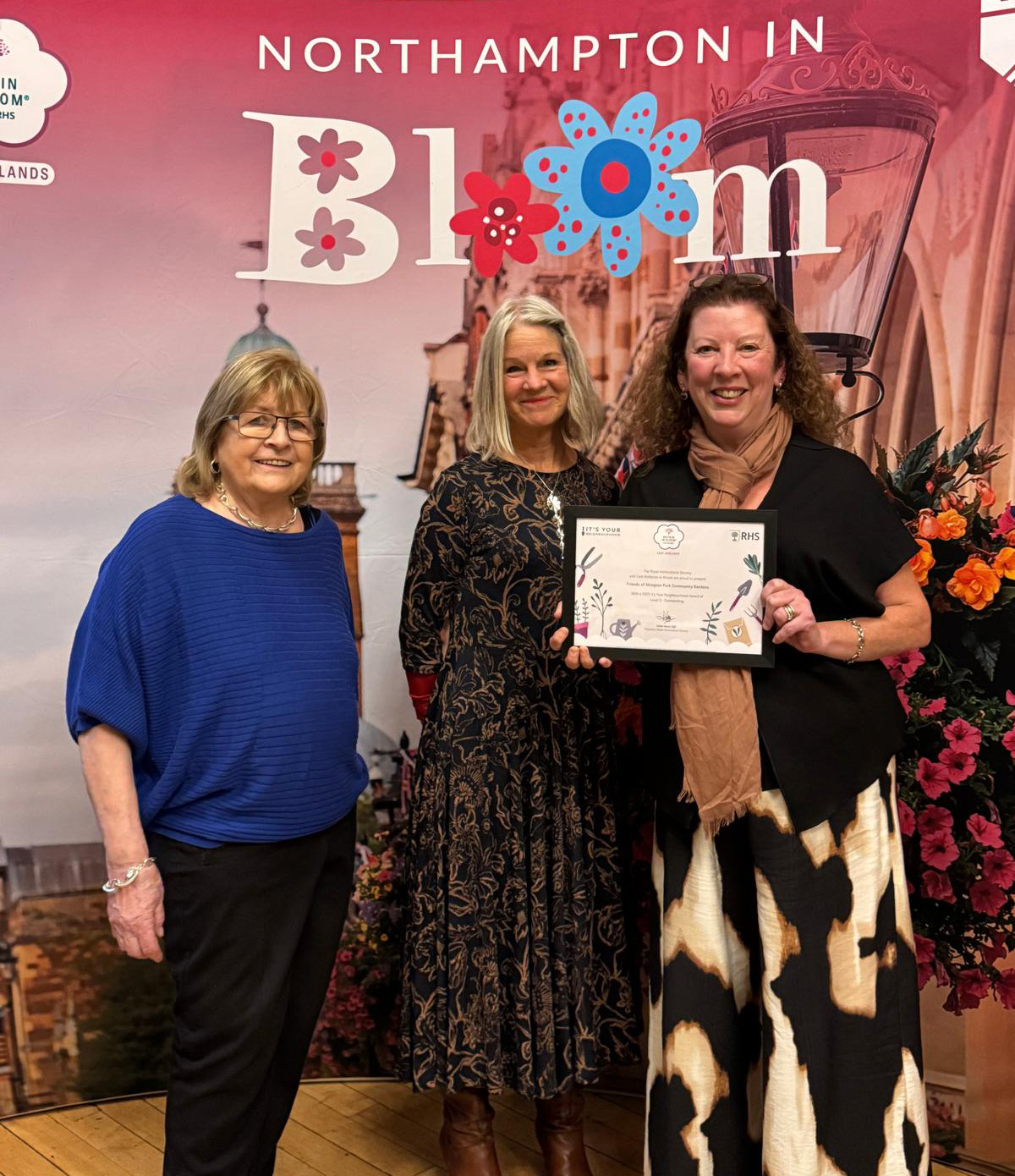 Friends of Abington Park receiving Britain in Bloom Neighbourhood award Level 5 - Outstanding